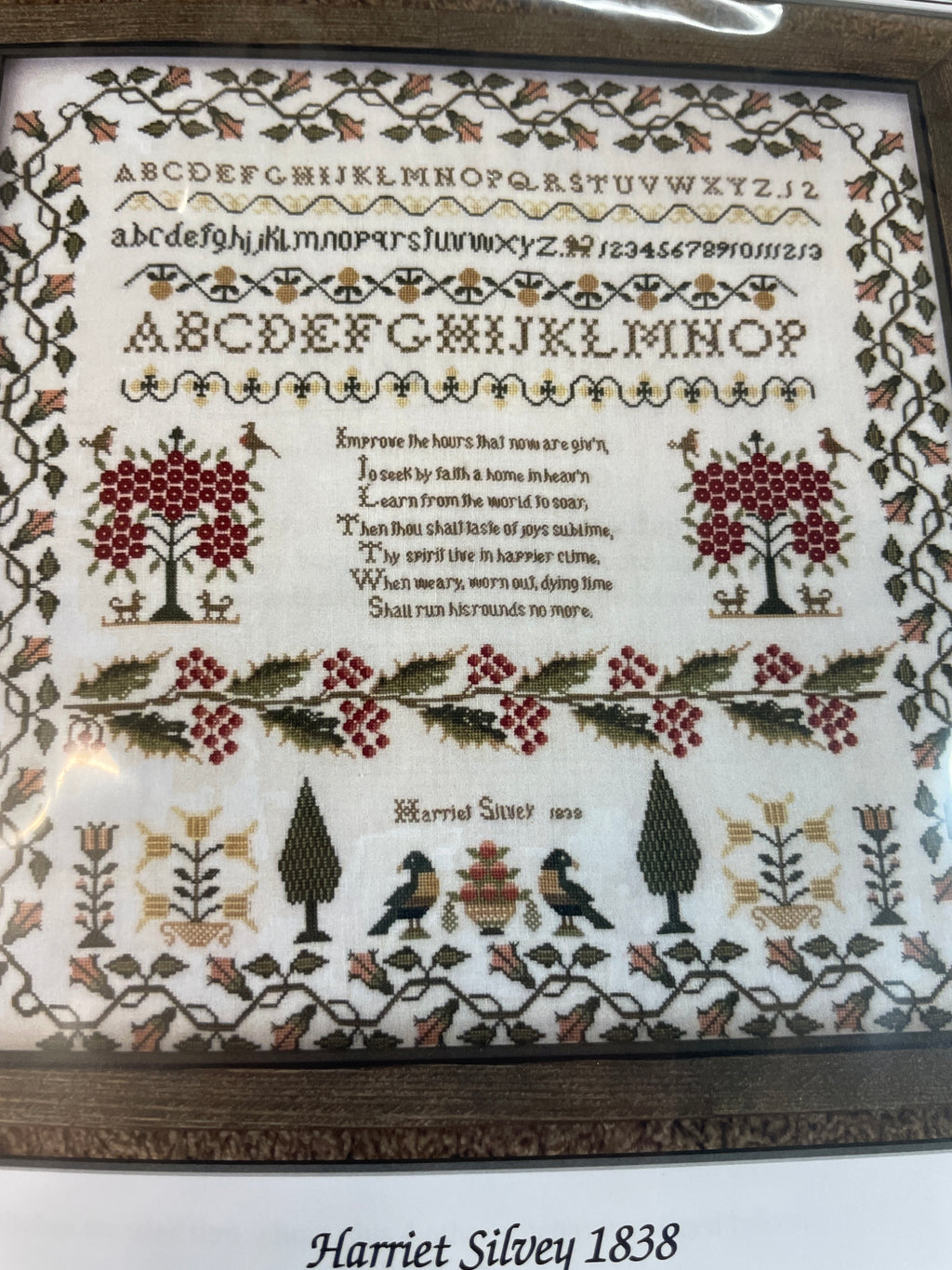 Harriet Silvey 1838 Holly Leaf Border Sampler
