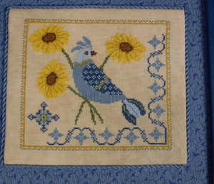 A Bluebird’s Sunflower Serenade
