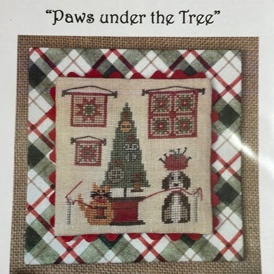 Paws under the tree